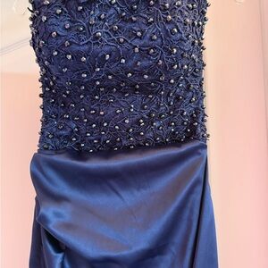 Kosovo designer blue gown